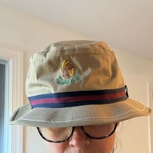 Tan Derby Cap Bucket Hat with Embroidered Pueblo Country Club Logo